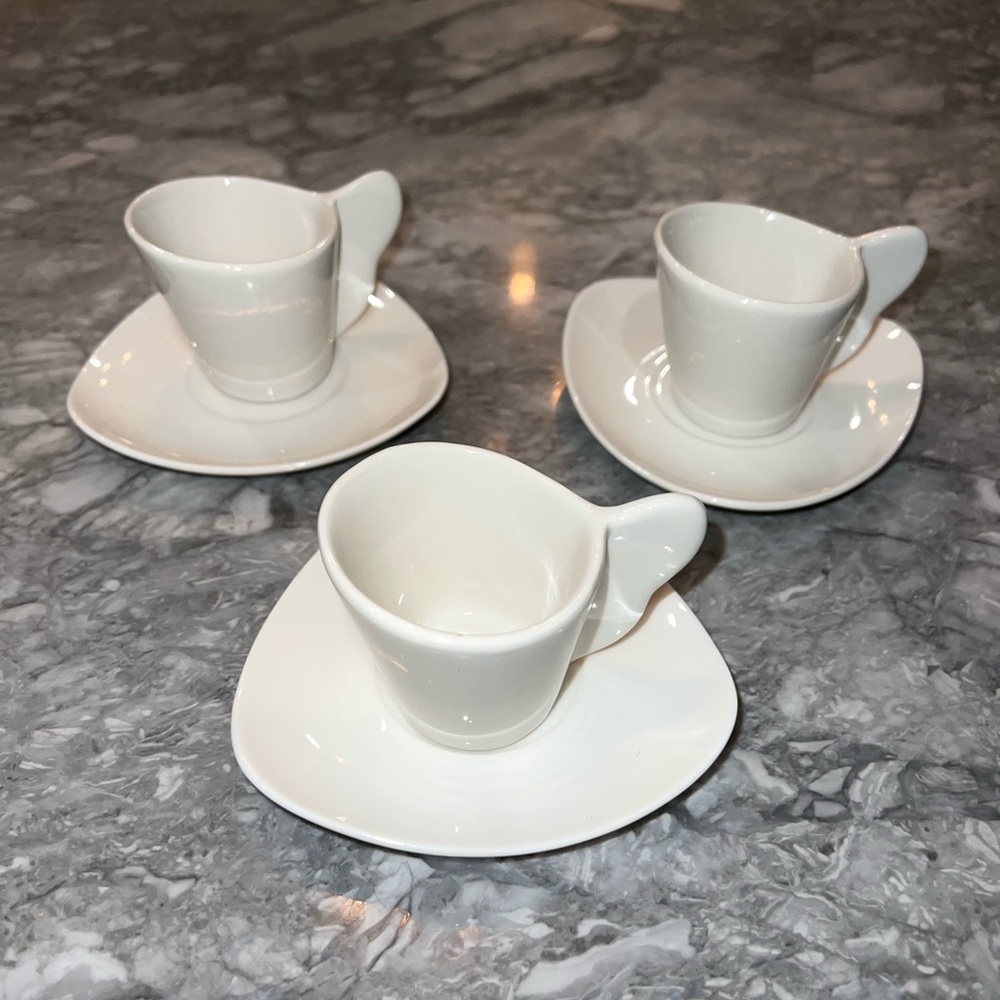 Set of espresso coffee cups and saucers